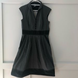 Navy and White polka dot dress with pockets.